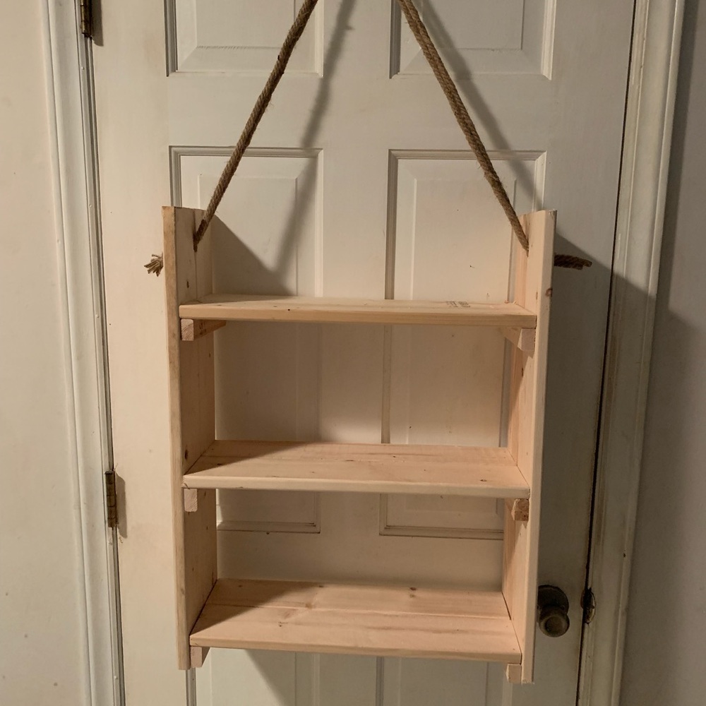 Custom made bathroom organizer shelf. Natural wood